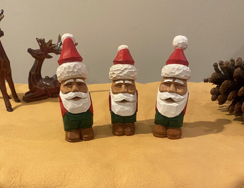 311_woodcarving_santas.jpg